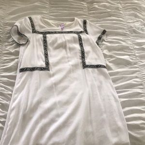 White dress with navy embroidery